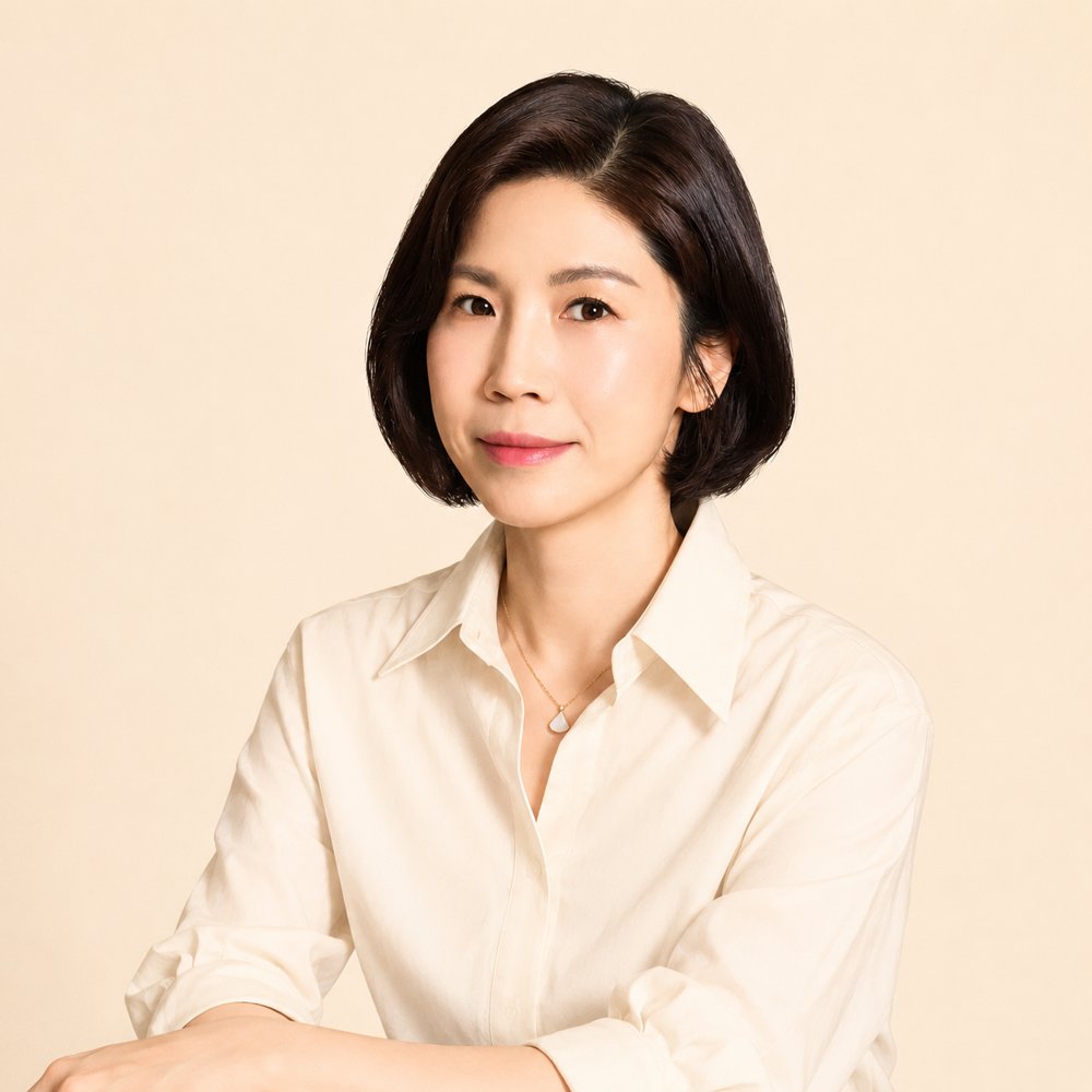 Eonni, Korean tutor, smiling in an ivory blouse